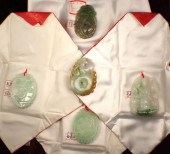 FIVE CHINESE CARVED JADE PENDA