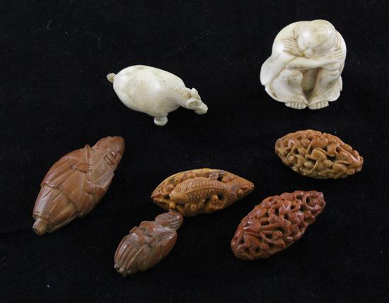 Five Chinese peach stone carvings