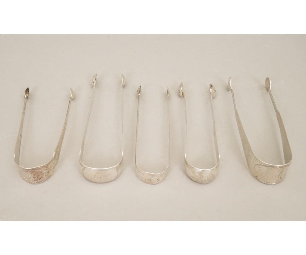 Five coin silver sugar tongs to