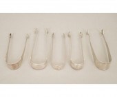 Five coin silver sugar tongs t