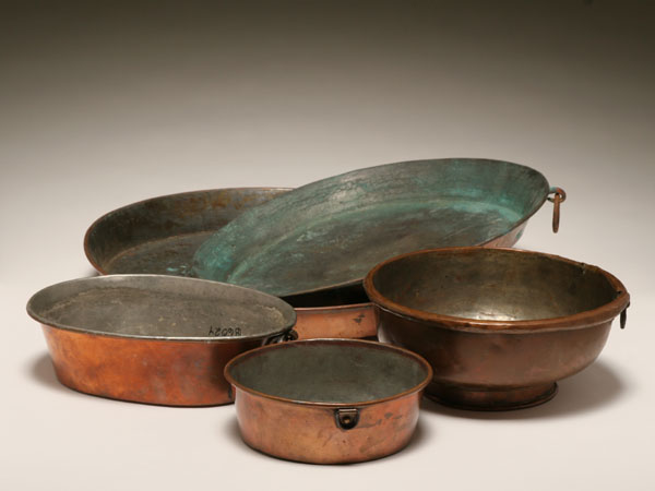 Five copper pieces; two shallow