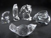 Five crystal animal figurines.