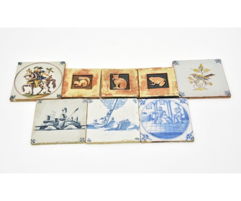 Five Delft tiles of birds, rider,