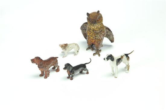 FIVE DOG AND OWL FIGURINES. 