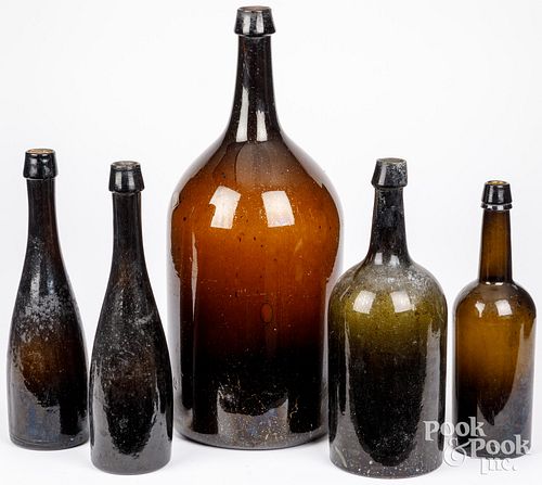 FIVE EARLY AMBER AND OLIVE GLASS