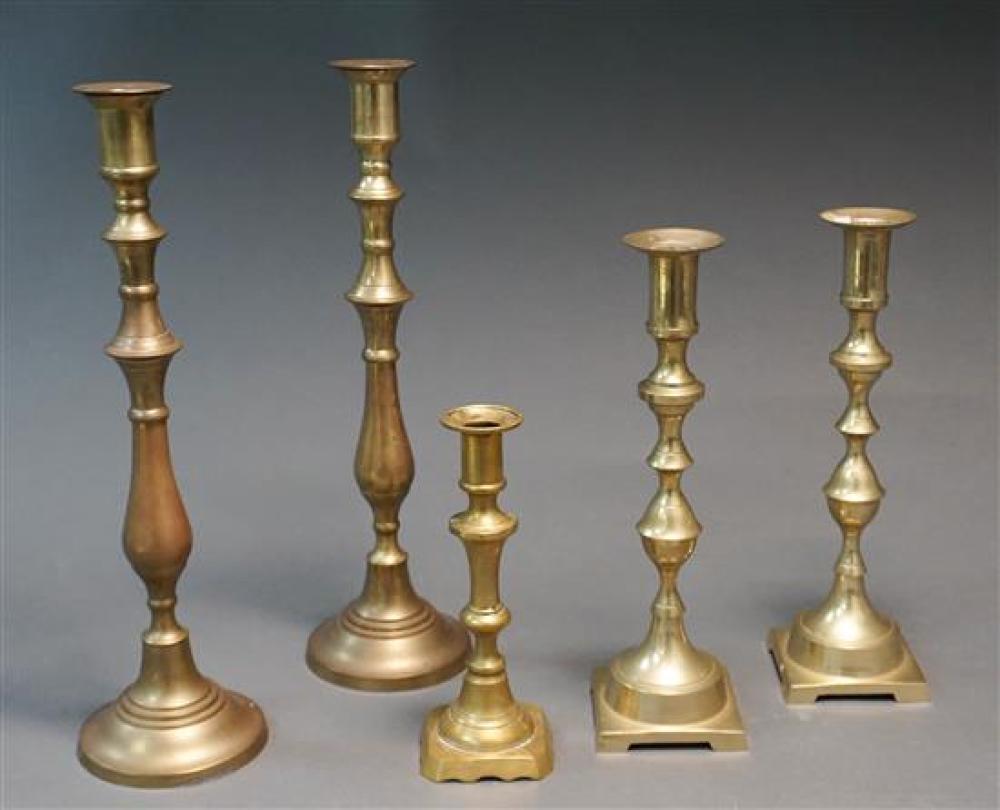 FIVE ENGLISH BRASS CANDLESTICKS,