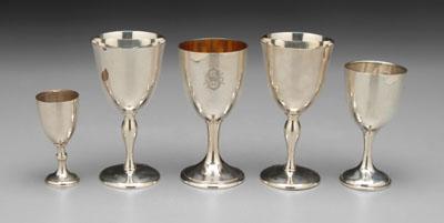 Five English silver goblets: one