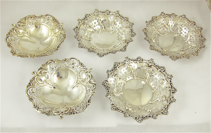 FIVE ENGLISH STERLING SILVER BOWLS: