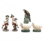 FIVE EXAMPLES OF POTTERY FIGUR