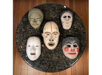 Five face masks including