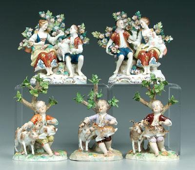 Five figurines: three of boys