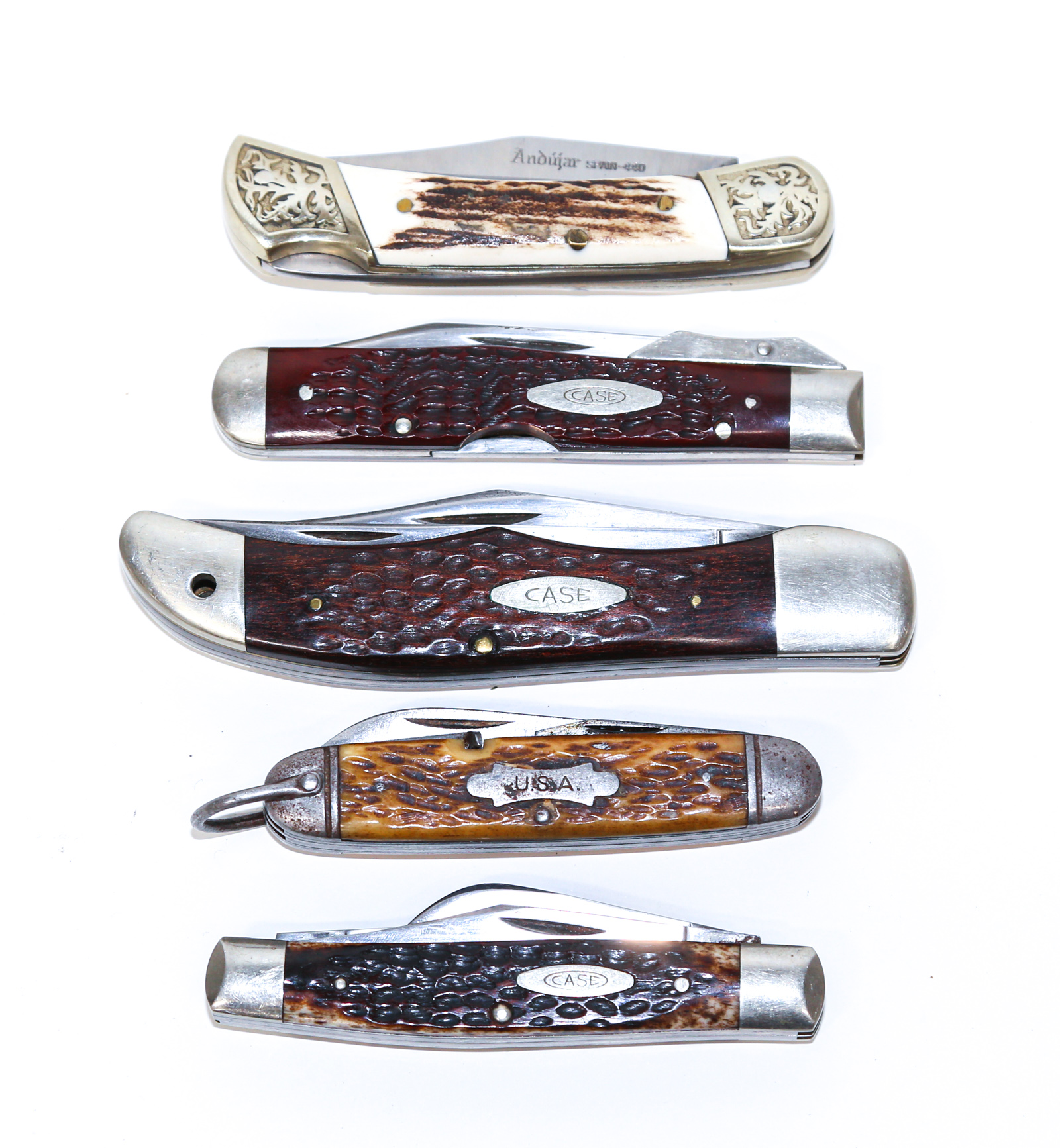 FIVE FOLDING KNIVES Including three