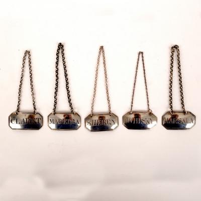 Five George III silver wine labels,