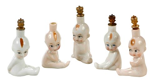 FIVE GERMAN CERAMIC KEWPIE DOLL