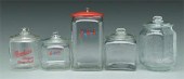 Five glass advertising jars: L