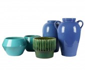FIVE GLAZED POTTERY PLANTERS &