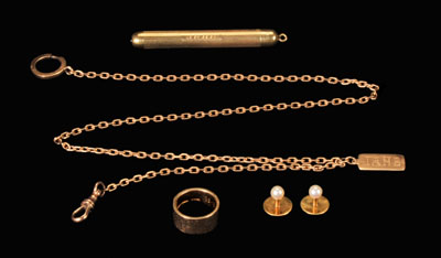 Five gold accessories, two Tiffany: