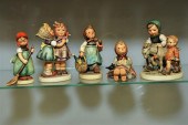 FIVE HUMMEL FIGURINES. Girl kn