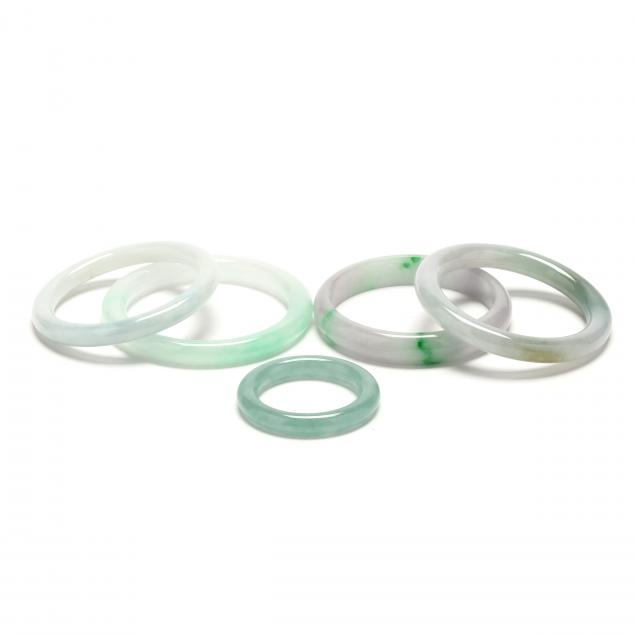 FIVE JADE BANGLES To include a