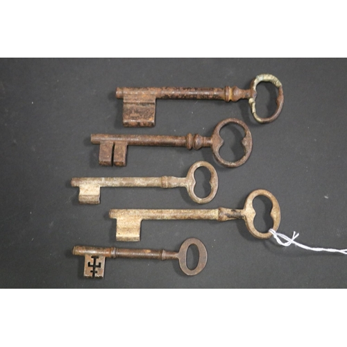 Five large antique French iron keys