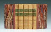 Five leather bound books, Edge