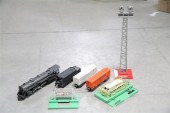 FIVE LIONEL TRAIN CARS AND ACC