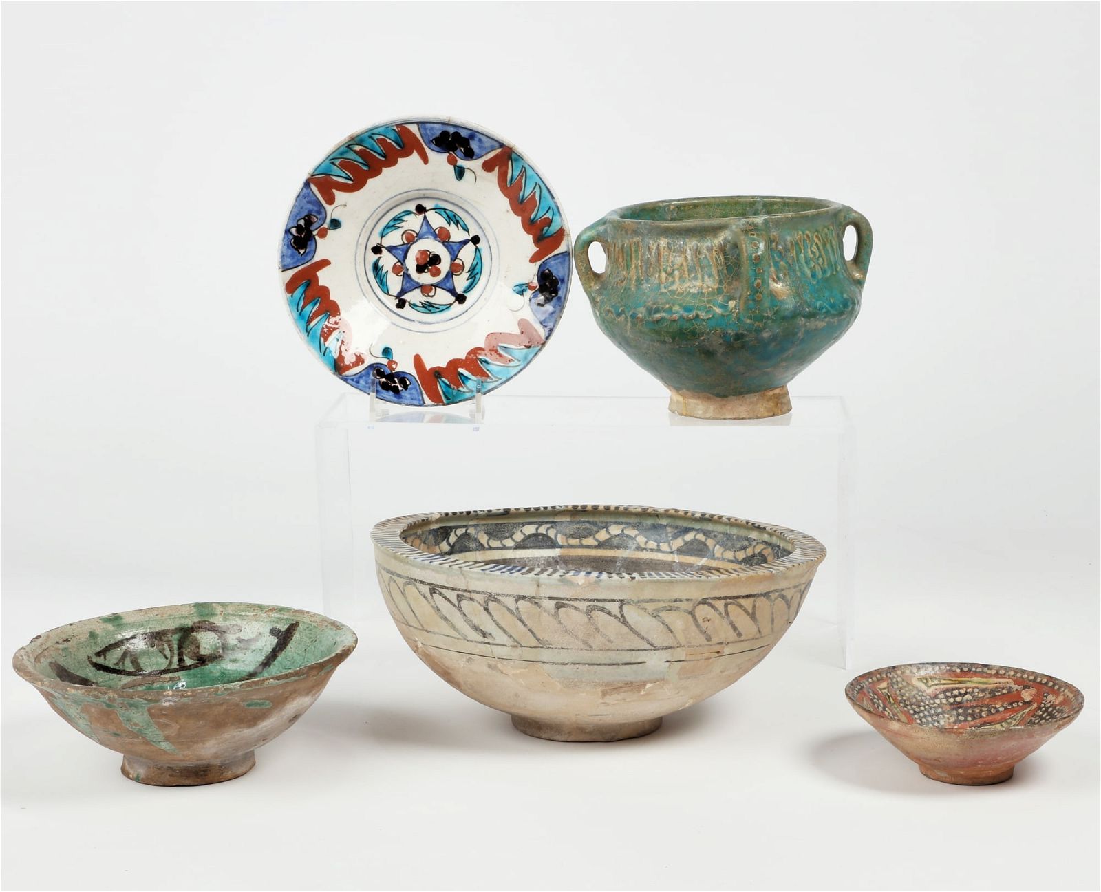 FIVE MIDDLE EASTERN POTTERY