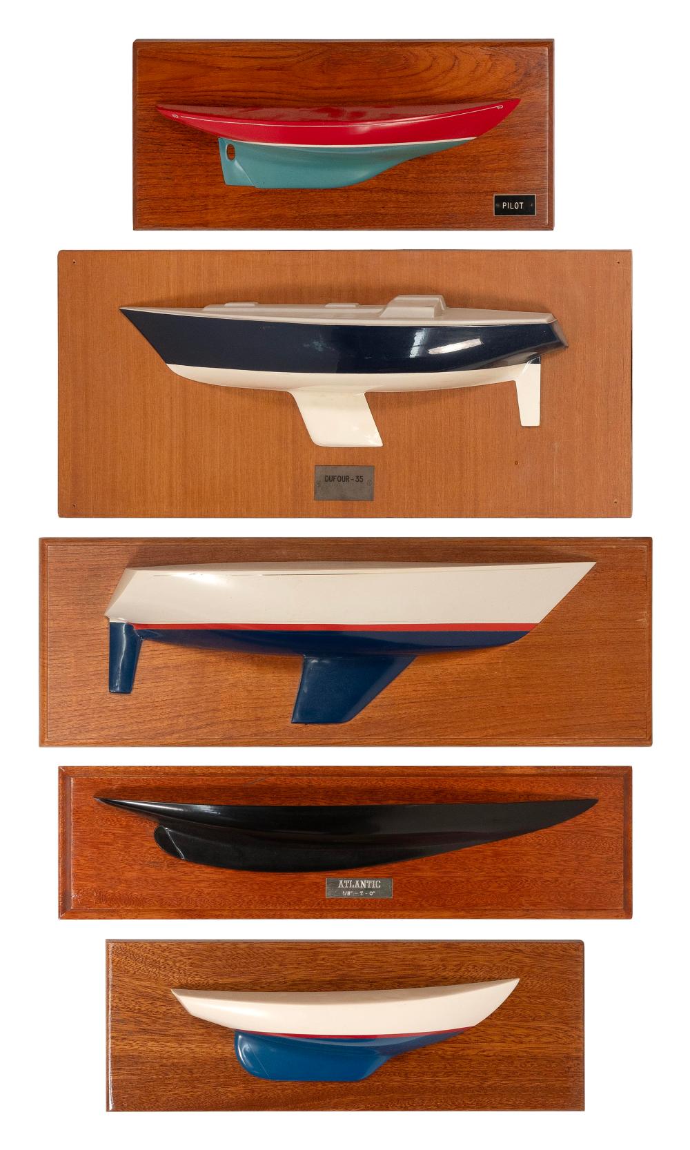 FIVE MOUNTED HALF HULL MODELS