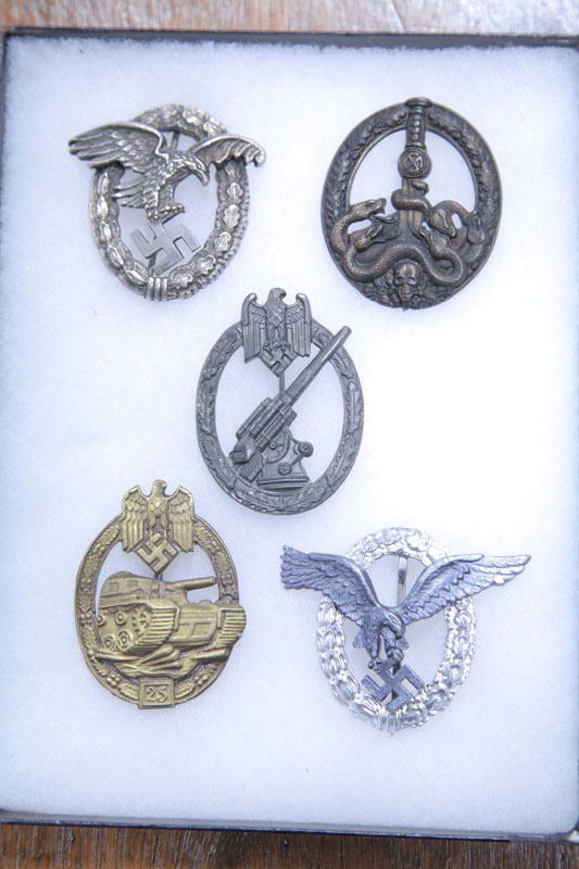 FIVE NAZI BADGES. Two similar