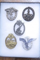 FIVE NAZI BADGES. Two similar
