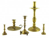 FIVE ODD BRASS CANDLESTICKS: R