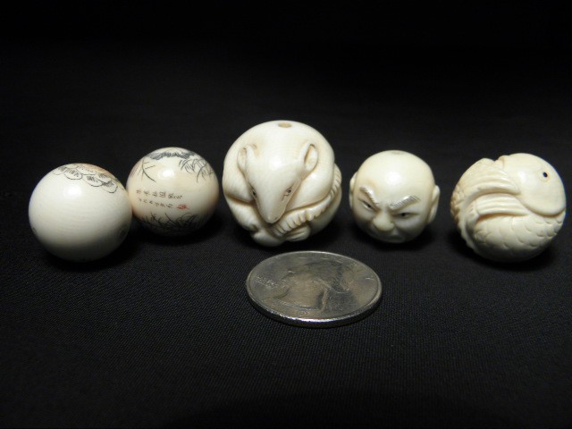 Five Oriental carved ivory