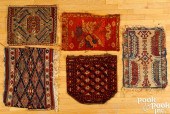 FIVE ORIENTAL MATS AND BAGFACE