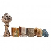 FIVE PAIRS OF STONE BOOKENDS A
