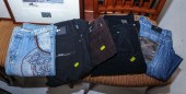 FIVE PAIRS OF VERSACE JEANS OR
