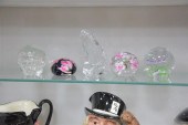 FIVE PAPERWEIGHTS. Clear glass
