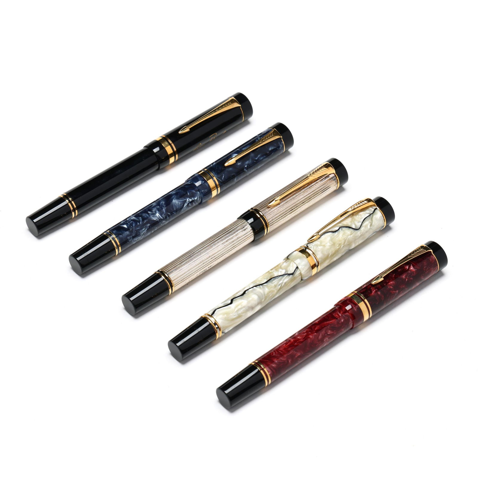 FIVE PARKER FOUNTAIN PENS,