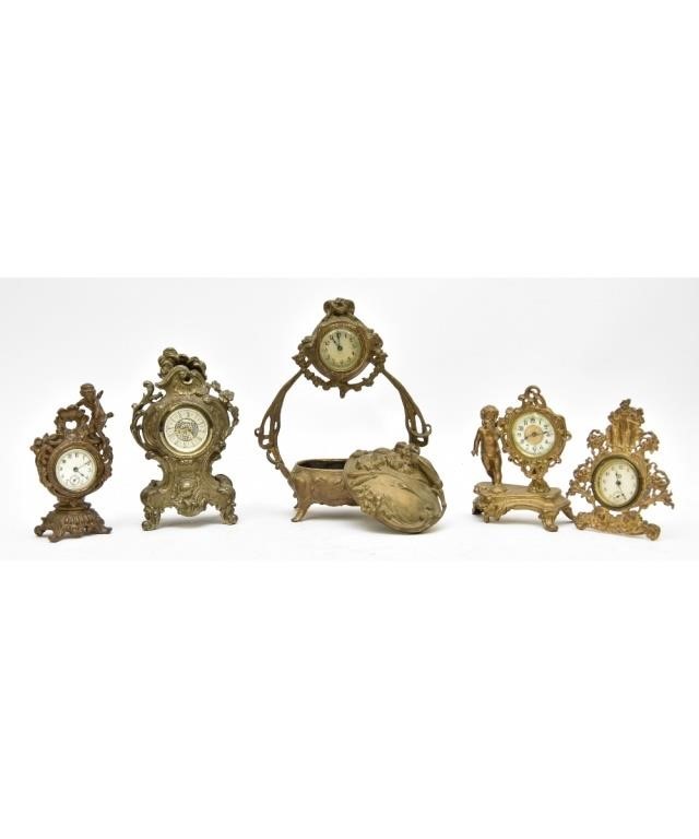 Five patinated gilt white metal