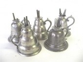 Five  pewter bell- form chambe