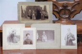 FIVE PHOTOGRAPHS. American  la
