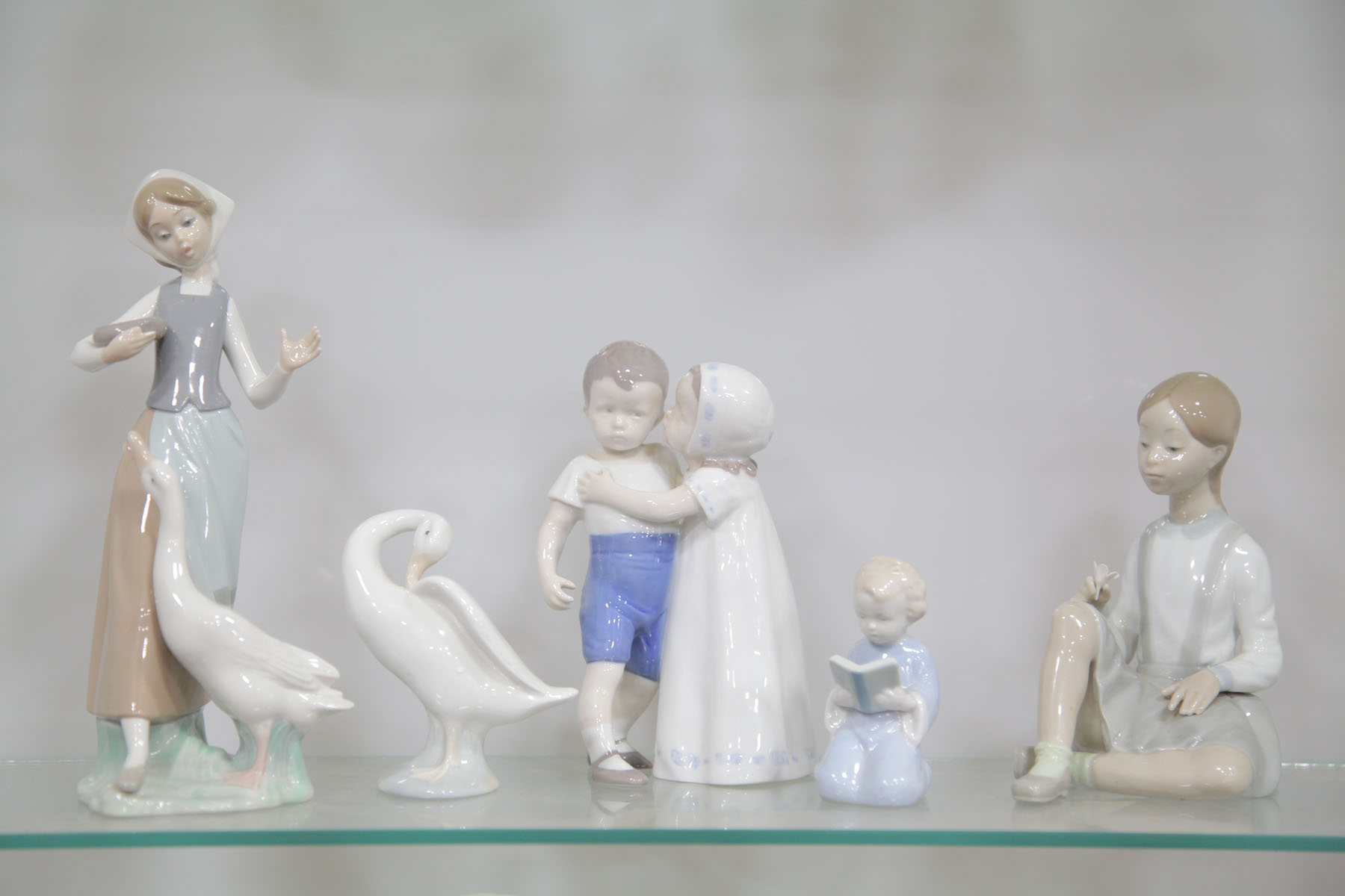 FIVE PORCELAIN FIGURES. 