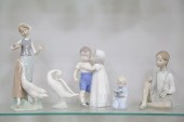 FIVE PORCELAIN FIGURES.  Europ
