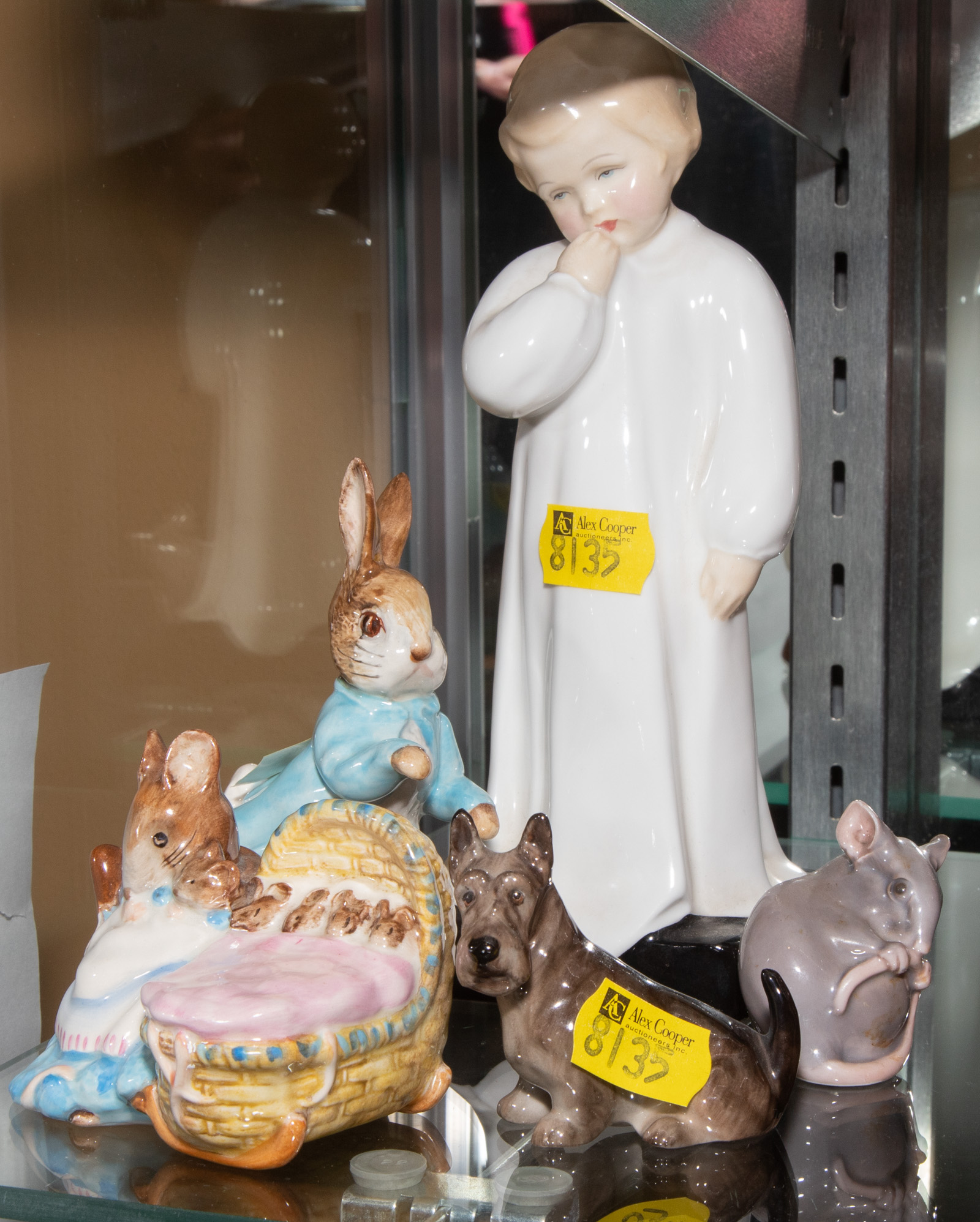 FIVE PORCELAIN FIGURES Includes