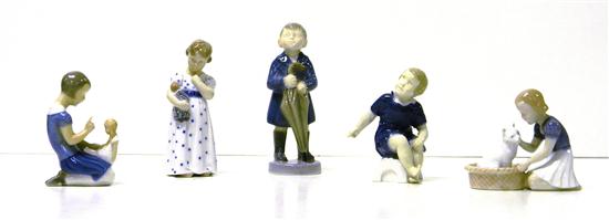 Five porcelain figures of children:
