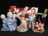 Five porcelain figurines: boy