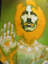 Five posters of The Beatles by