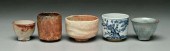 Five pottery tea bowls, three