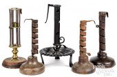 FIVE PRIMITIVE CANDLESTICKS, P