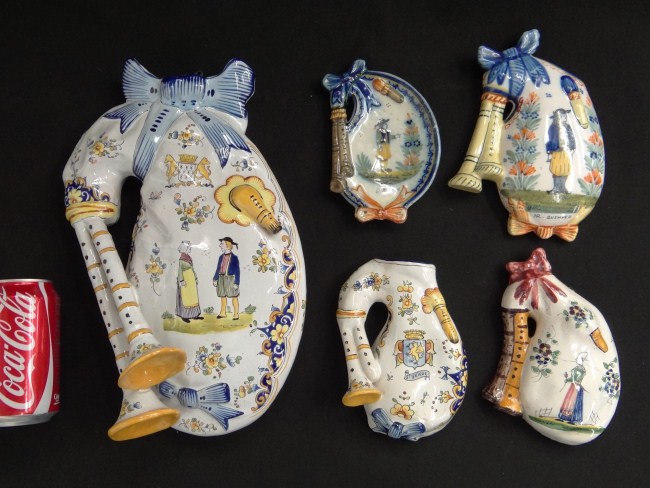 Five Quimper wall hangings four