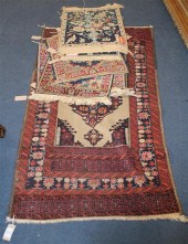 Five Qum mats each with centra